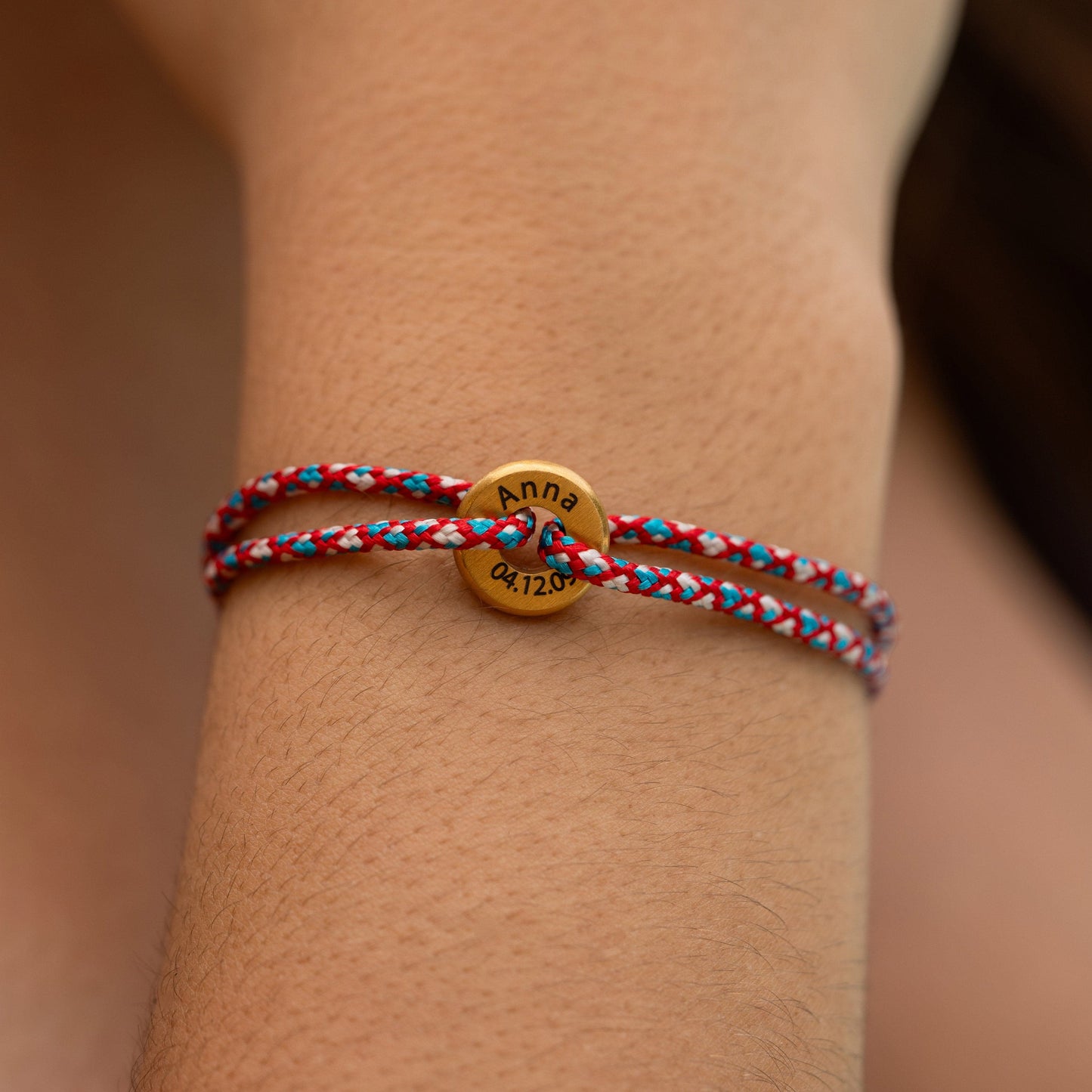 Armband mit Edelstahl-Ring und Kordelband