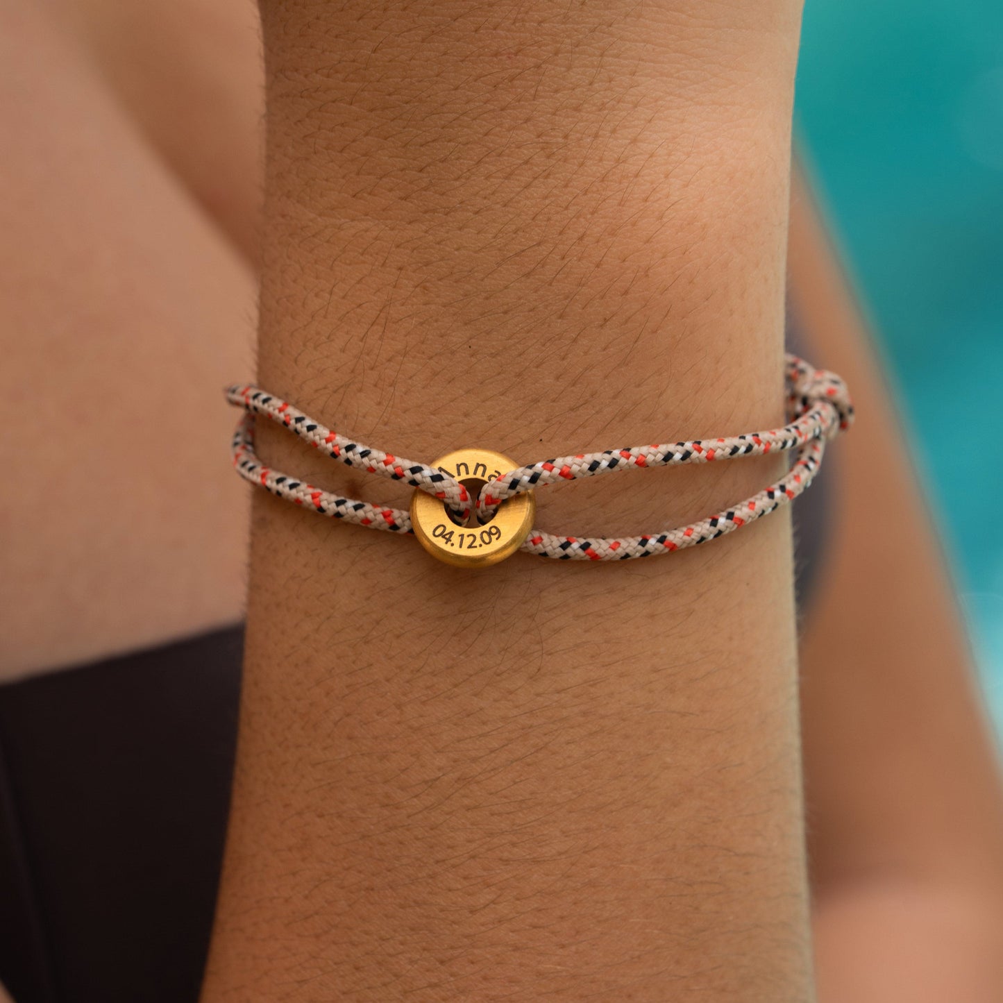 Armband mit Edelstahl-Ring und Kordelband